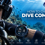 Diver using a dive computer while scuba diving